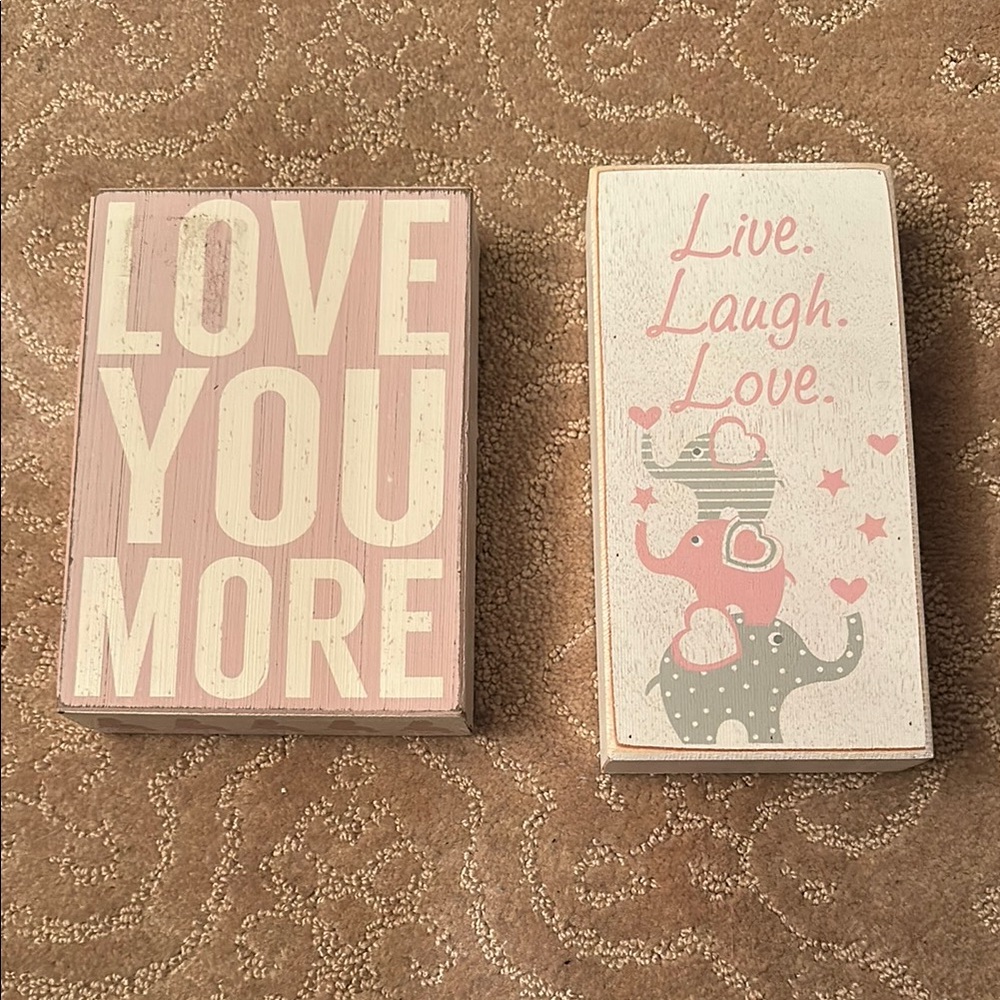 Pink and White Decorative Signs